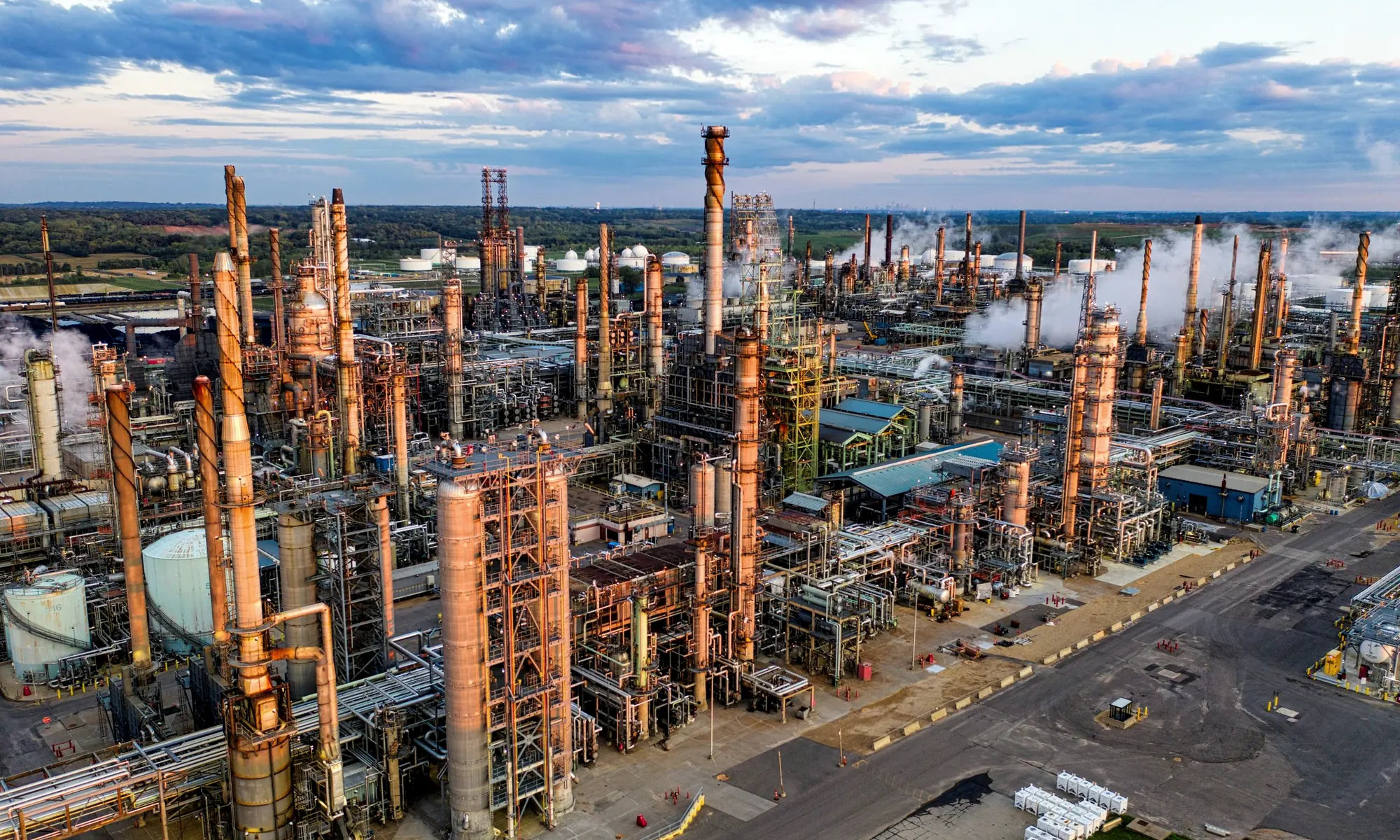 Coated bolting for corrosive plant service
